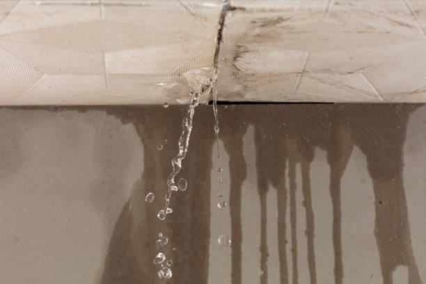 Professional Flood Damage Cleanup technician working in Brookville, PA